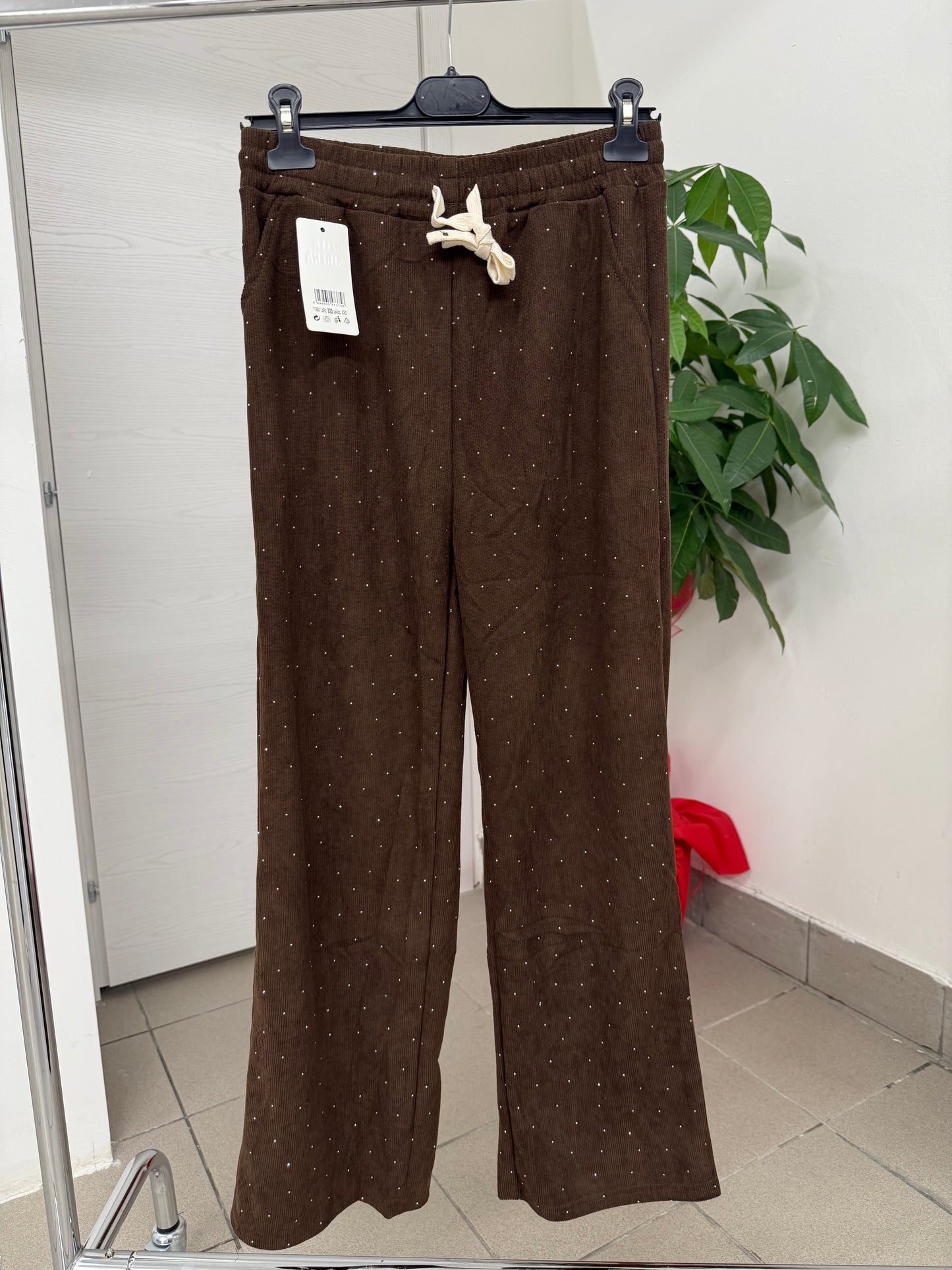 Pantalone tuta a costine brillantinato