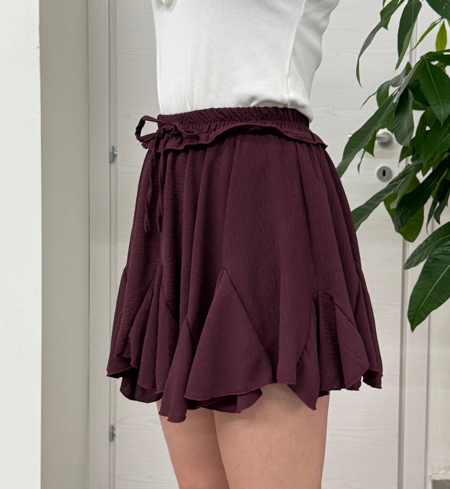 Mini gonna a pieghe con pantaloncino FGD MODA
