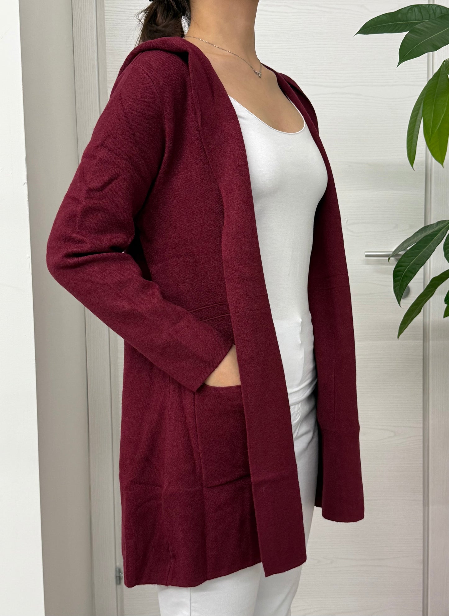 Cardigan maniche lunghe con cappuccio