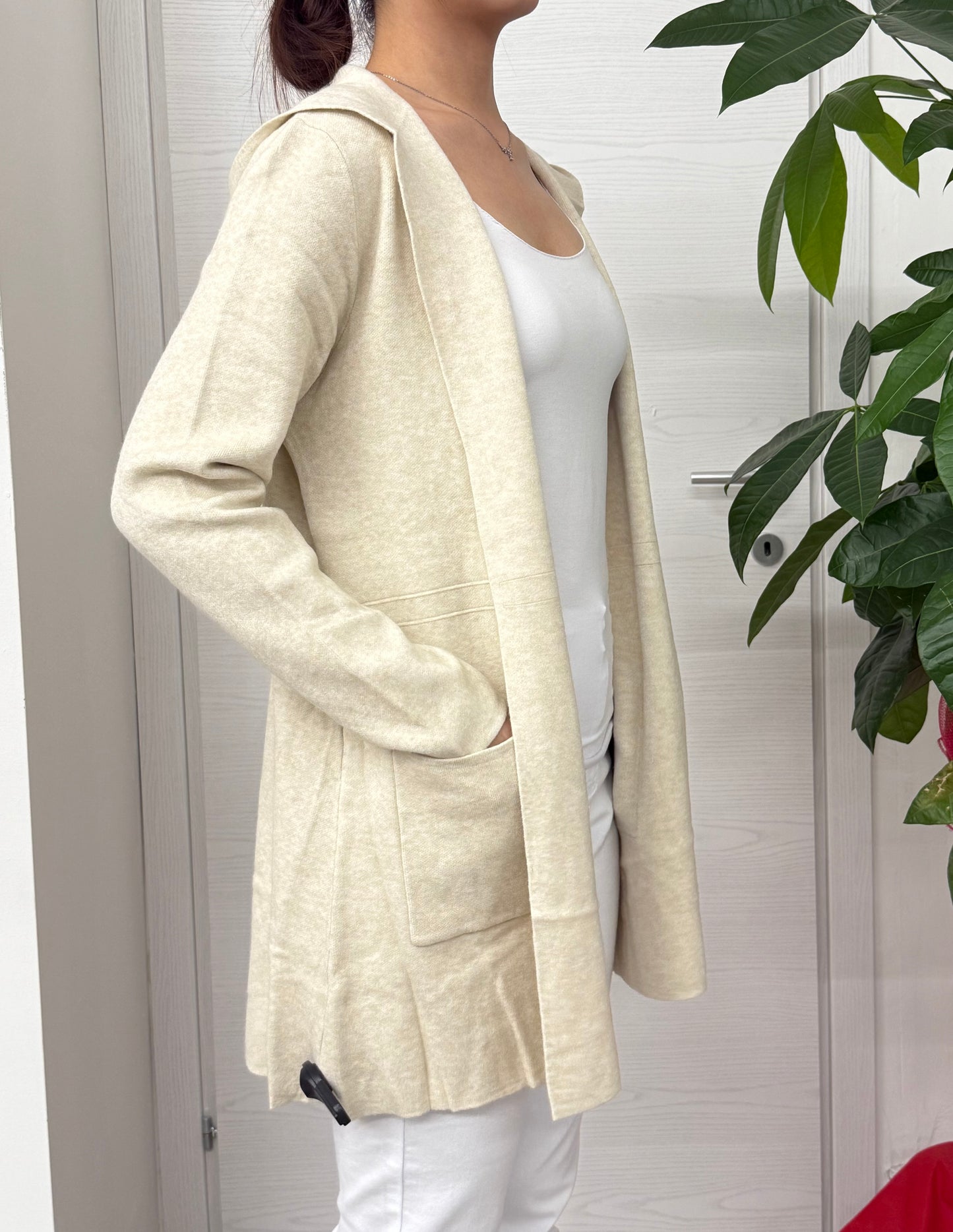 Cardigan maniche lunghe con cappuccio