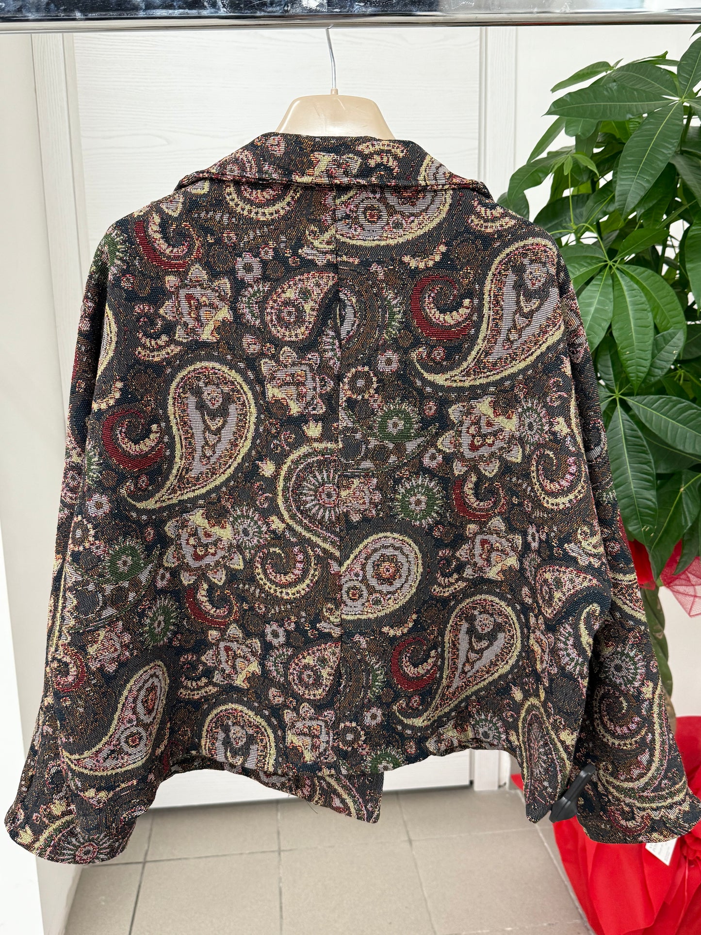 Giacca a fantasia con chiusura laterale