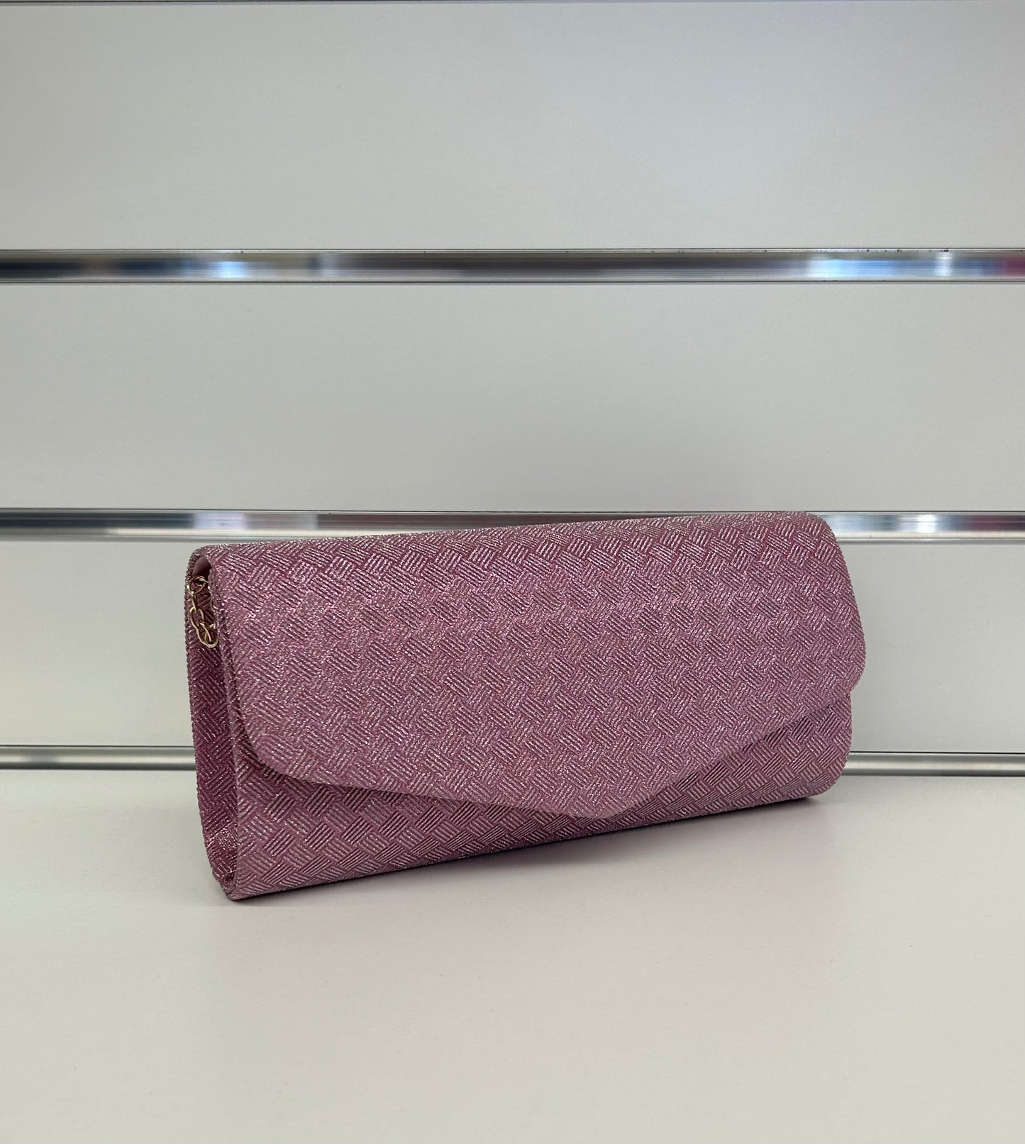 Pochette brillantanata con chiusura a bottone e tracolla FGD MODA