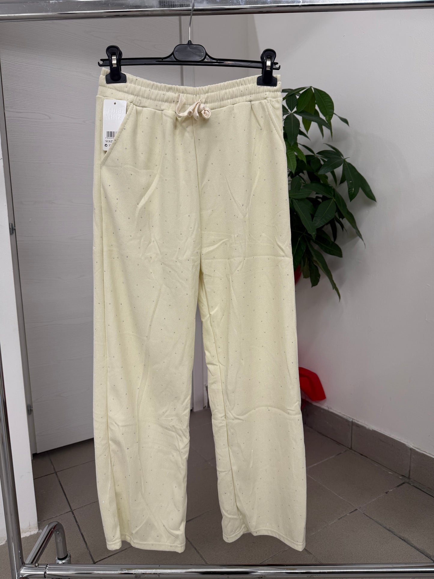 Pantalone tuta a costine brillantinato