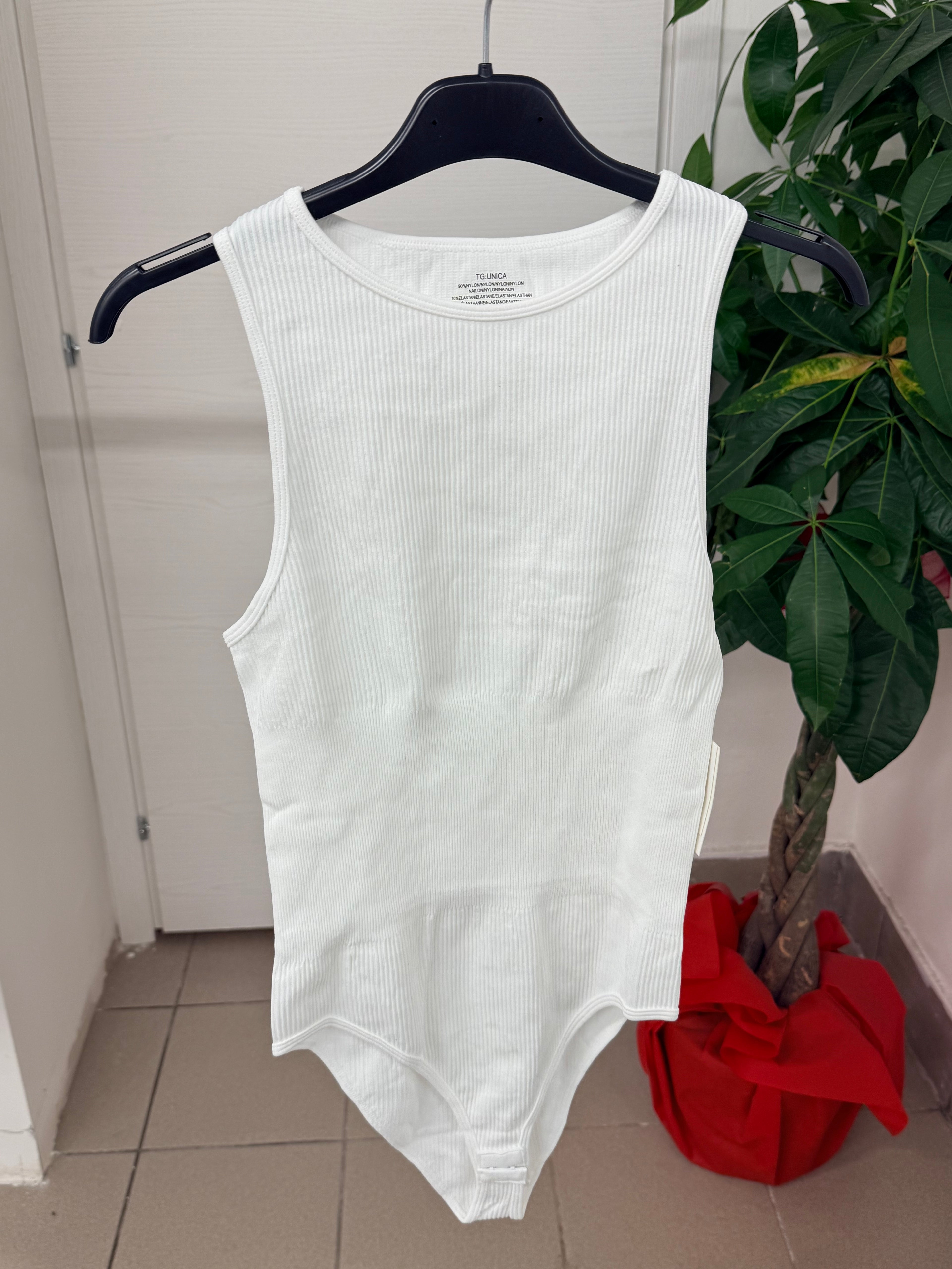 Body compattante a costine a bretelle FGD MODA