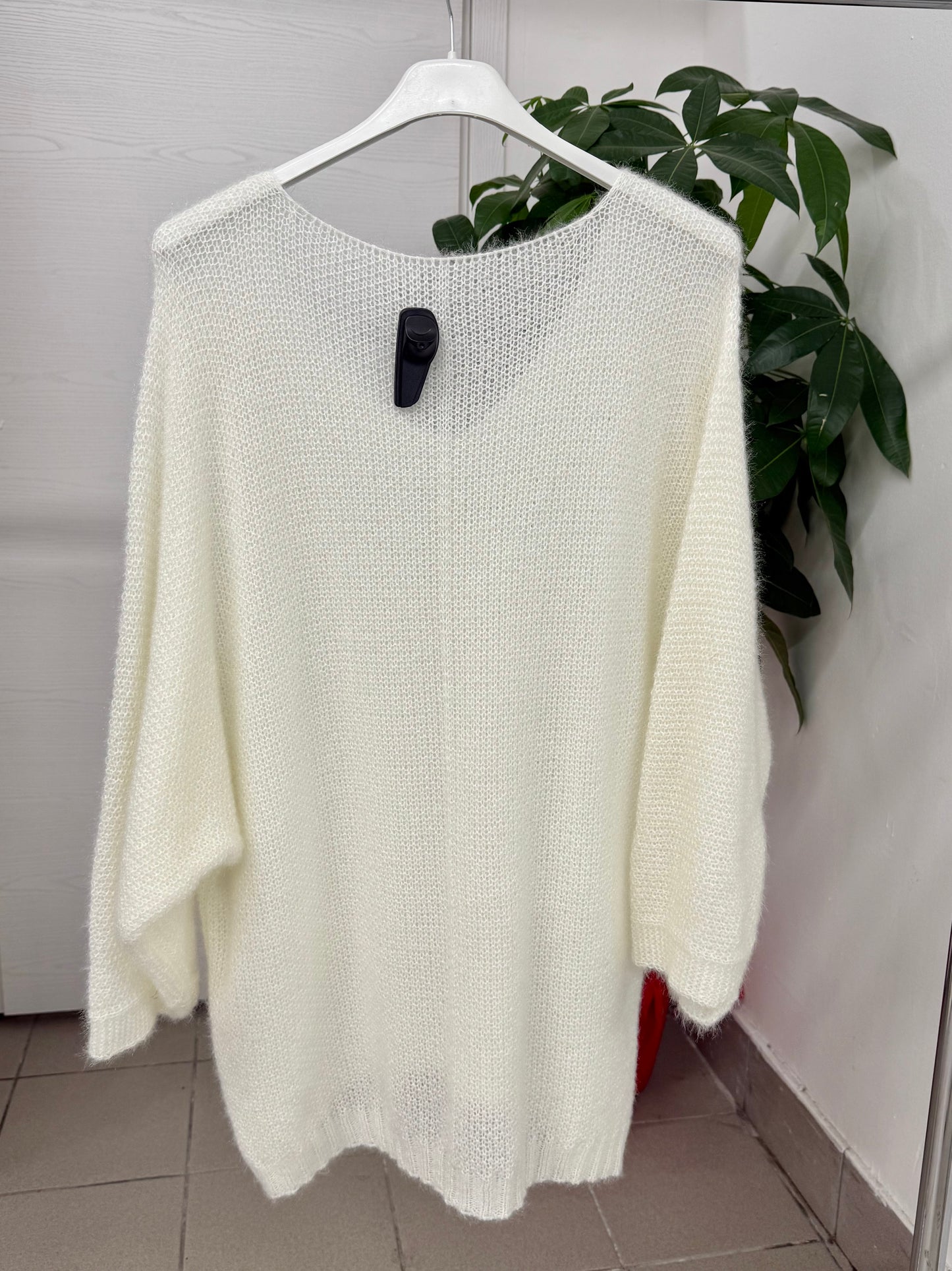 Maglioncino lungo tinta unita con maniche a pipistrello