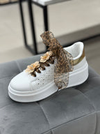 Sneakers platform alta con fiori