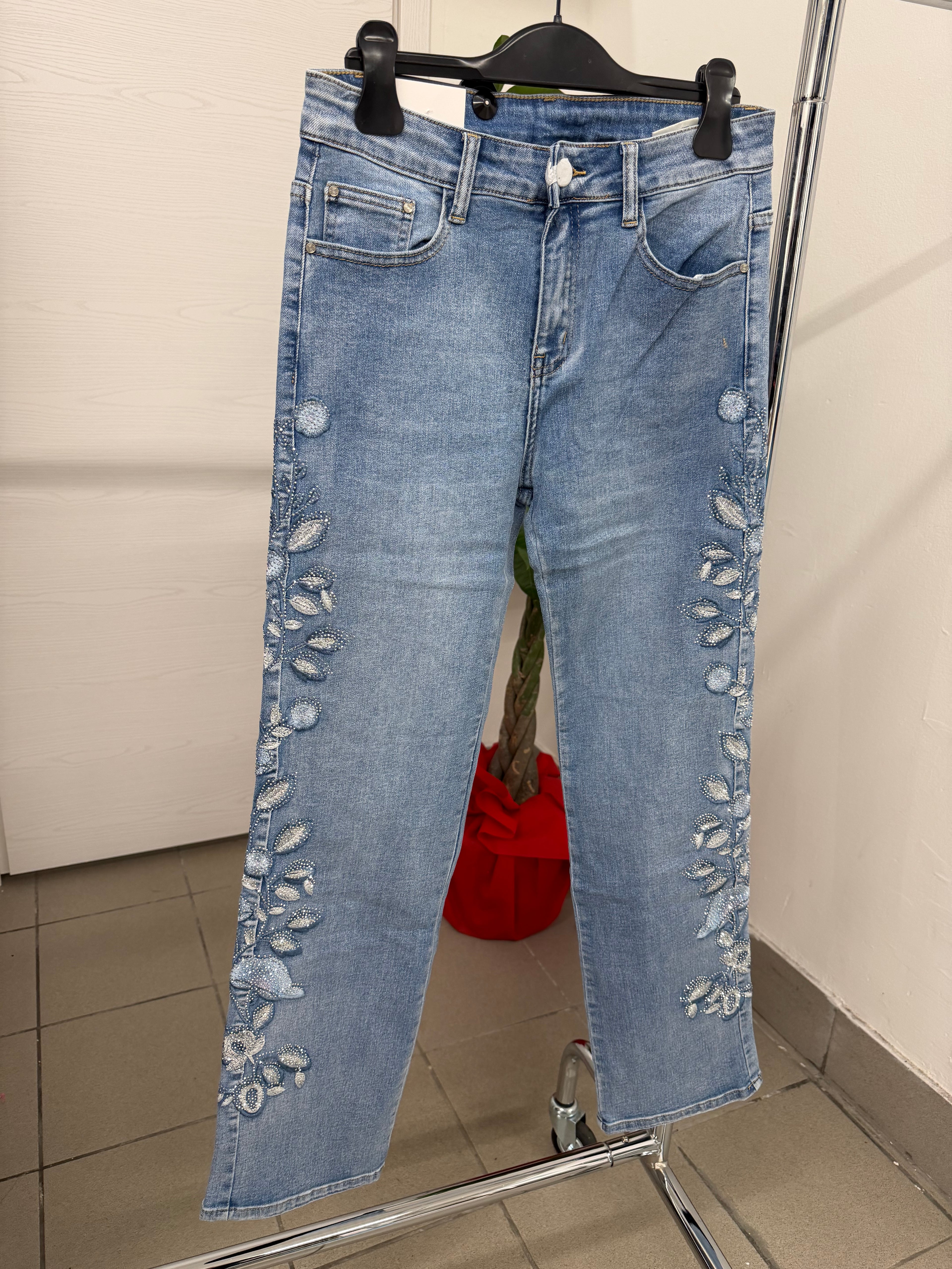 Jeans a sigaretta con fiori brillantini laterali
