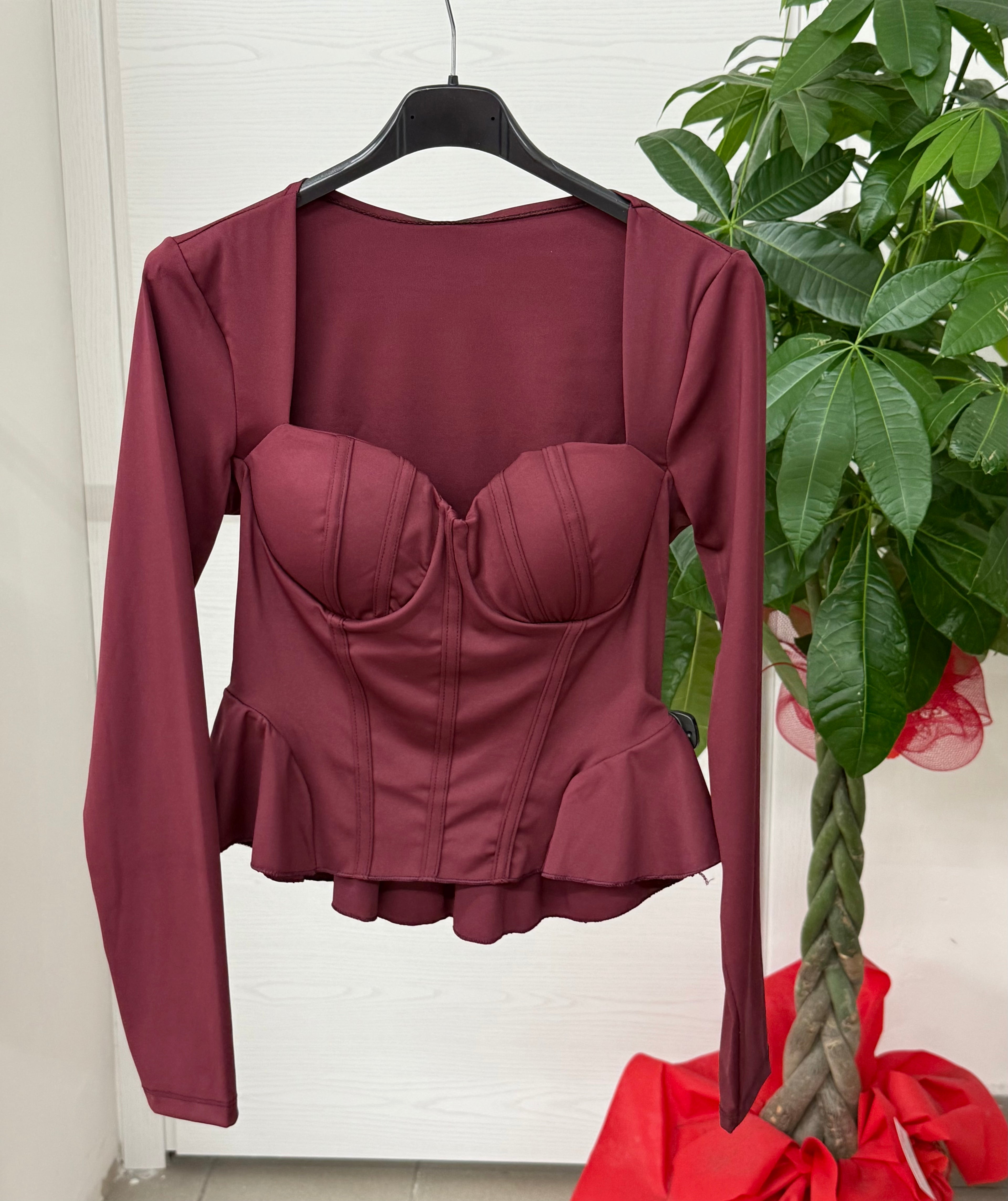 Top a maniche lunghe con volant sul bordo FGD MODA