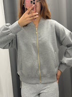 Felpa over fit con chiusura a zip e tasche FGD MODA