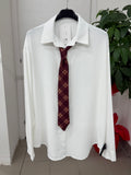 Camicia con cravatta scozzese