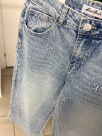 Jeans wide leg con fiocchi ricamati e brillantini FGD MODA