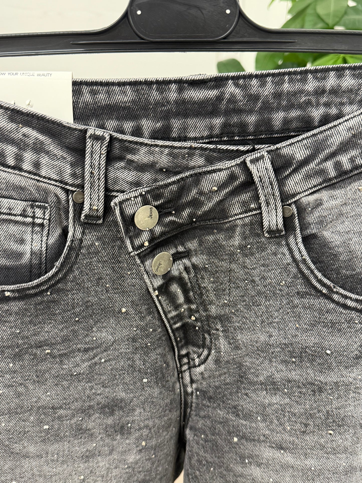 Jeans a palazzo brillantinato con risvolto con doppia abbottonatura FGD MODA