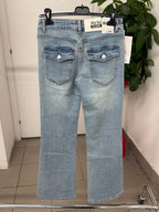 Jeans a campana a vita bassa con tasche