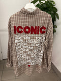 Camicia a quadri con taschino con scritta sul retro