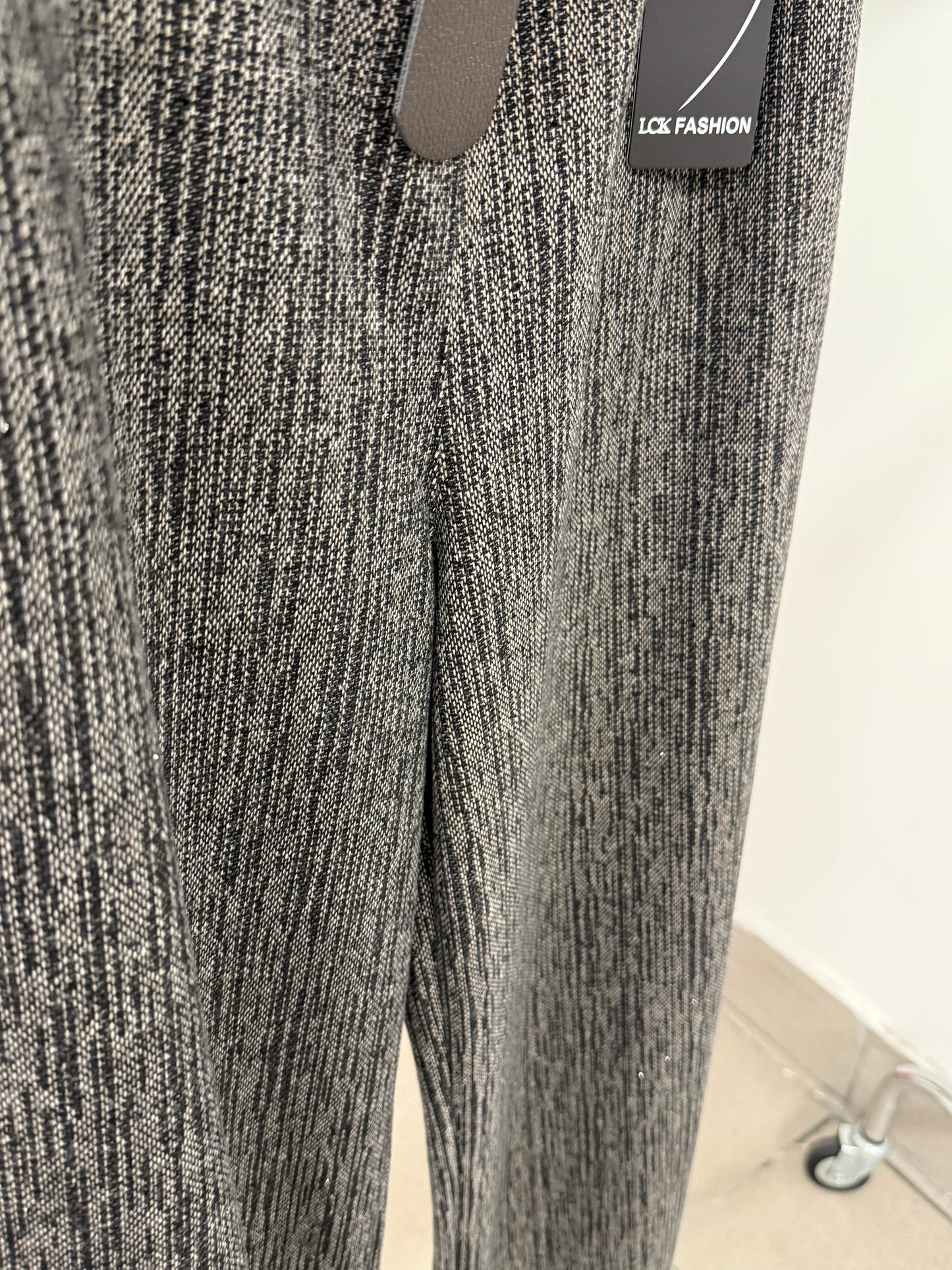 Pantaloni a palazzo brillantinati con cinta