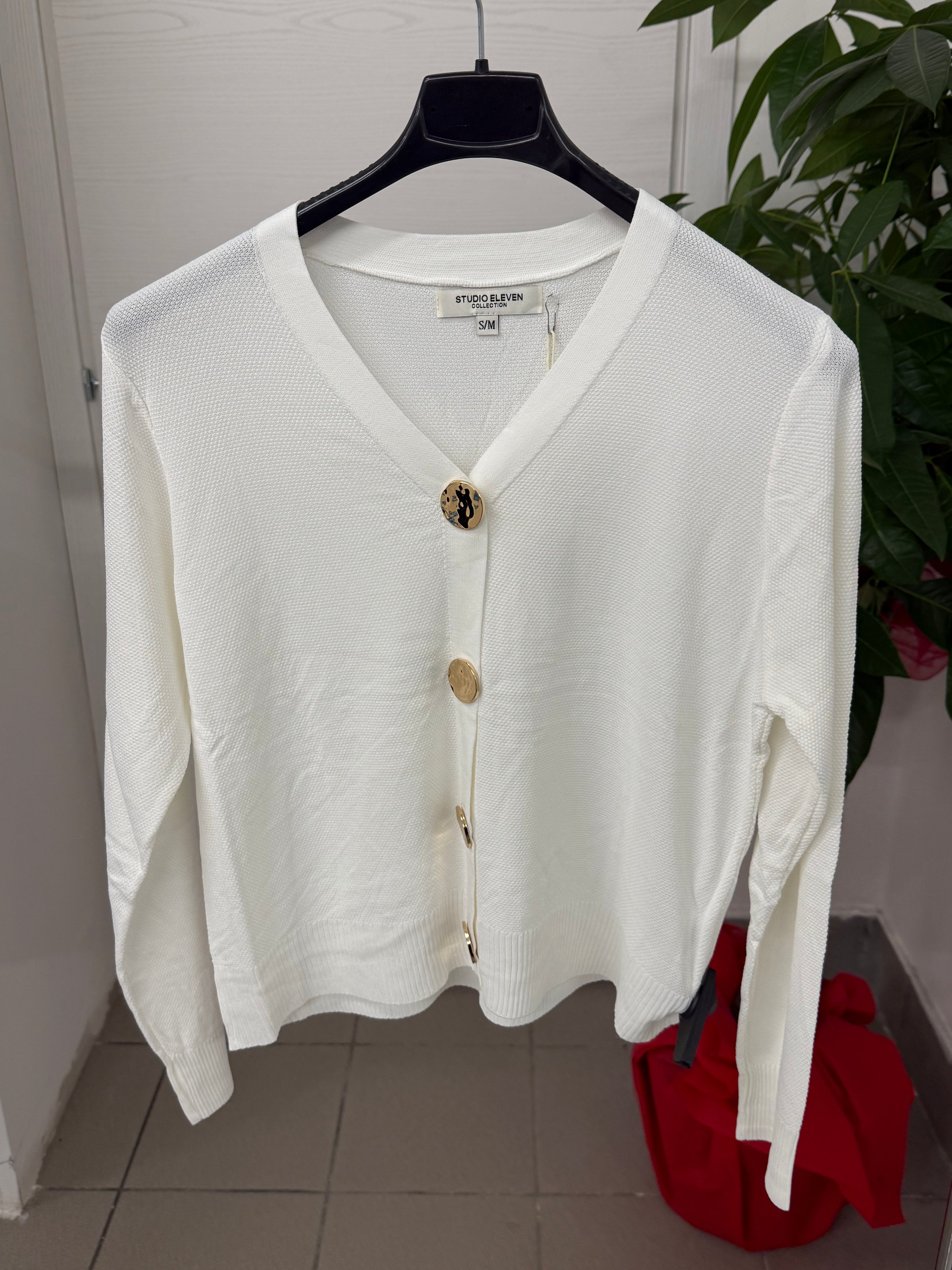 Cardigan con chiusura a bottoni