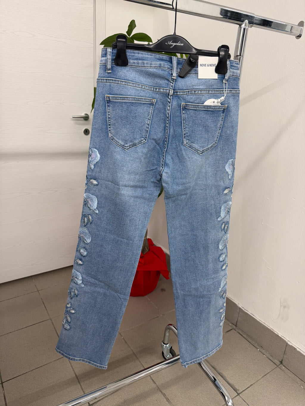 Jeans a sigaretta con fiori brillantini laterali