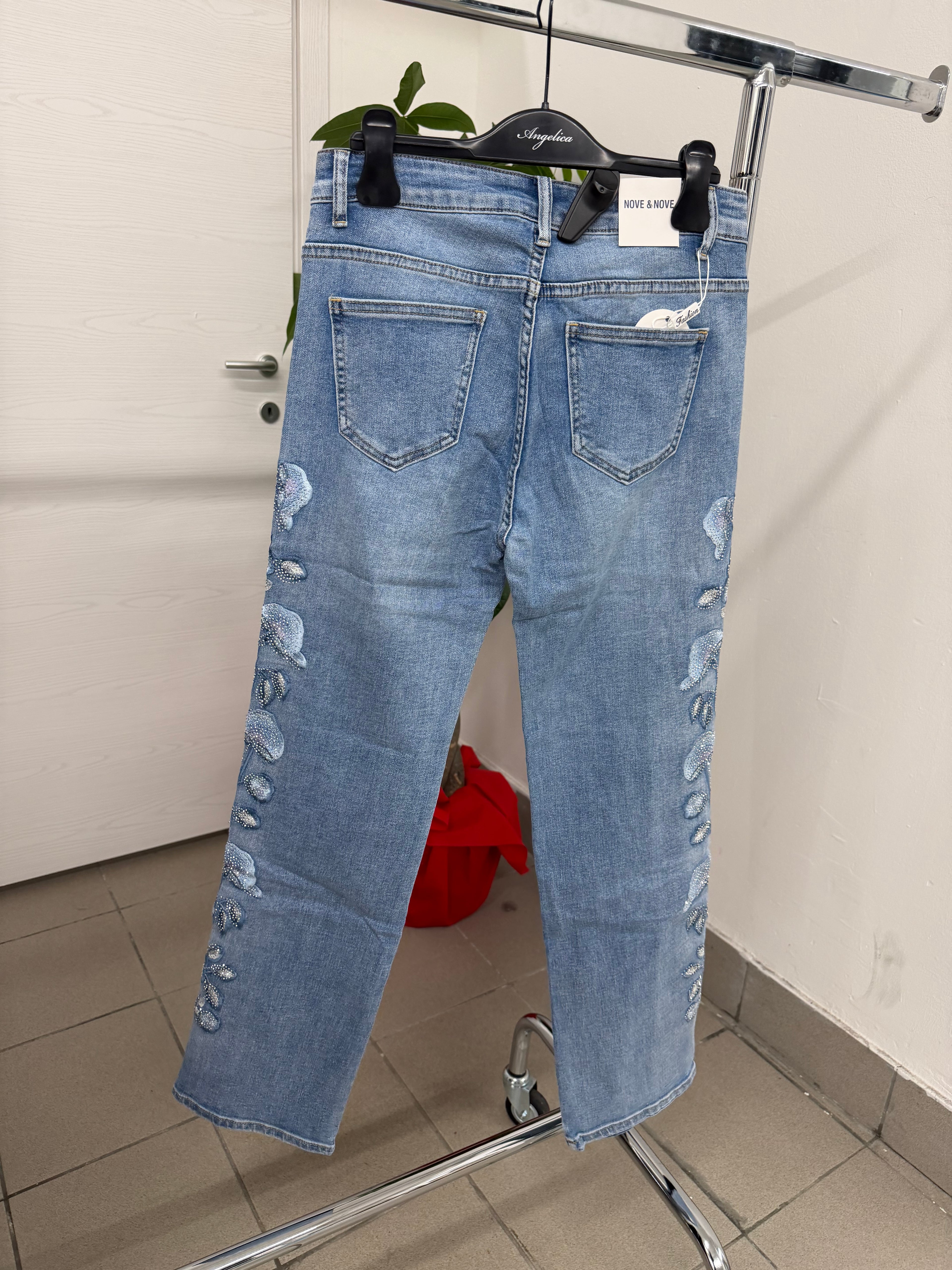 Jeans a sigaretta con fiori brillantini laterali