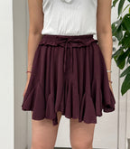 Mini gonna a pieghe con pantaloncino FGD MODA