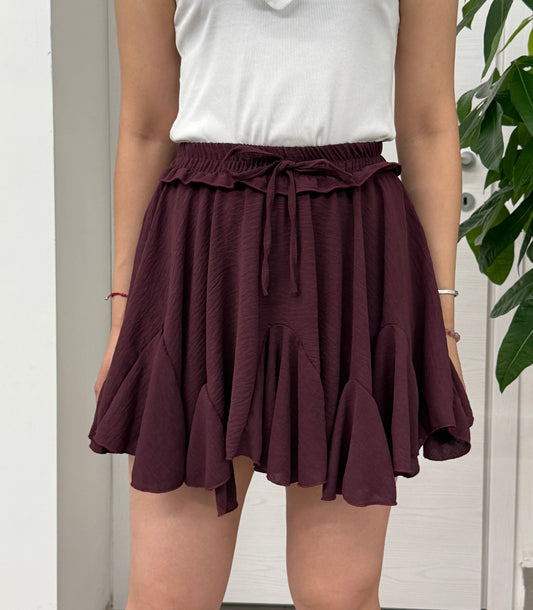 Mini gonna a pieghe con pantaloncino FGD MODA