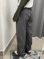 Pantaloni Asimmetrici Con Bottone Laterale FGD MODA