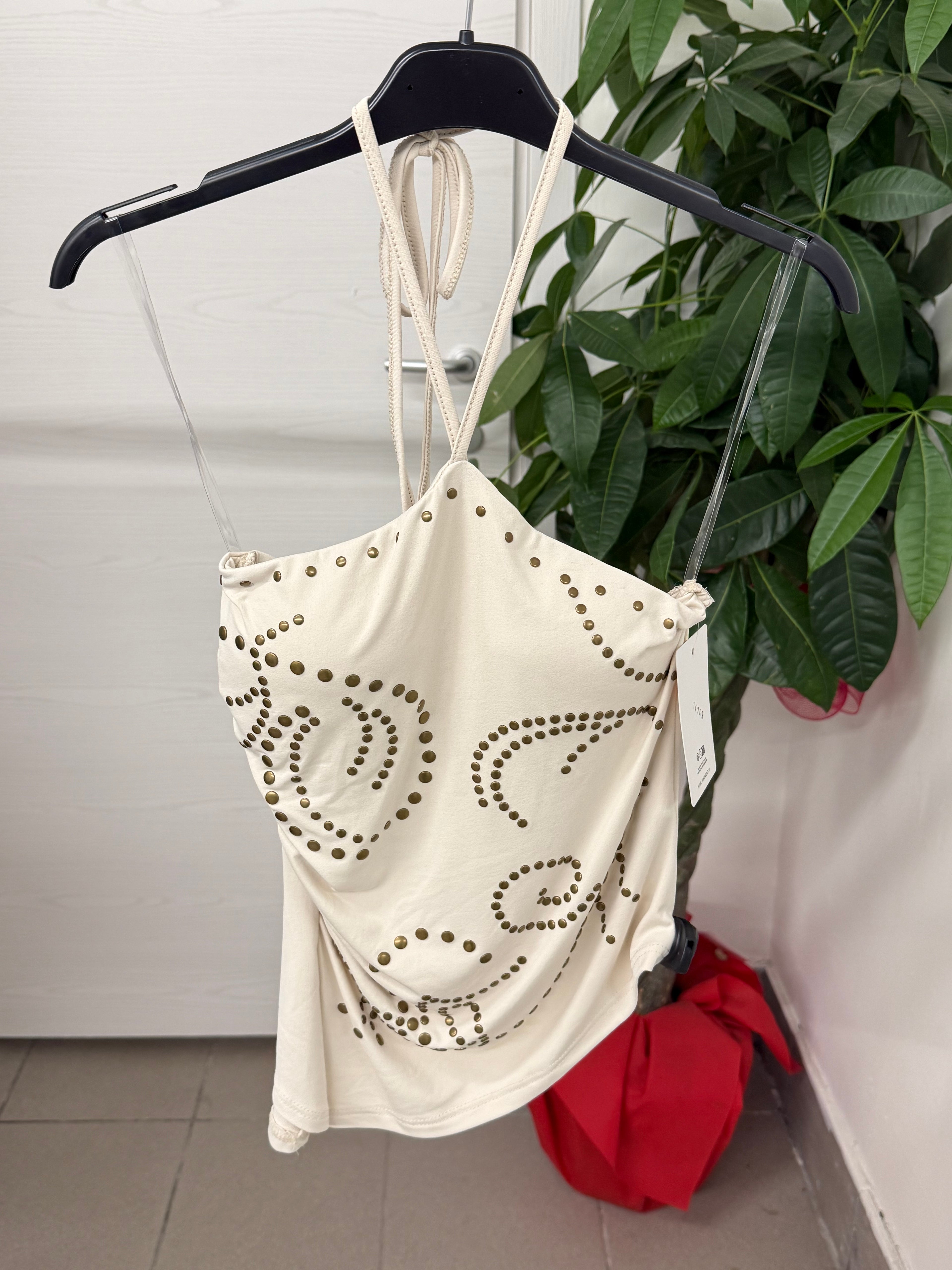 Top in lycra con taglio obliquo e borchie FGD MODA
