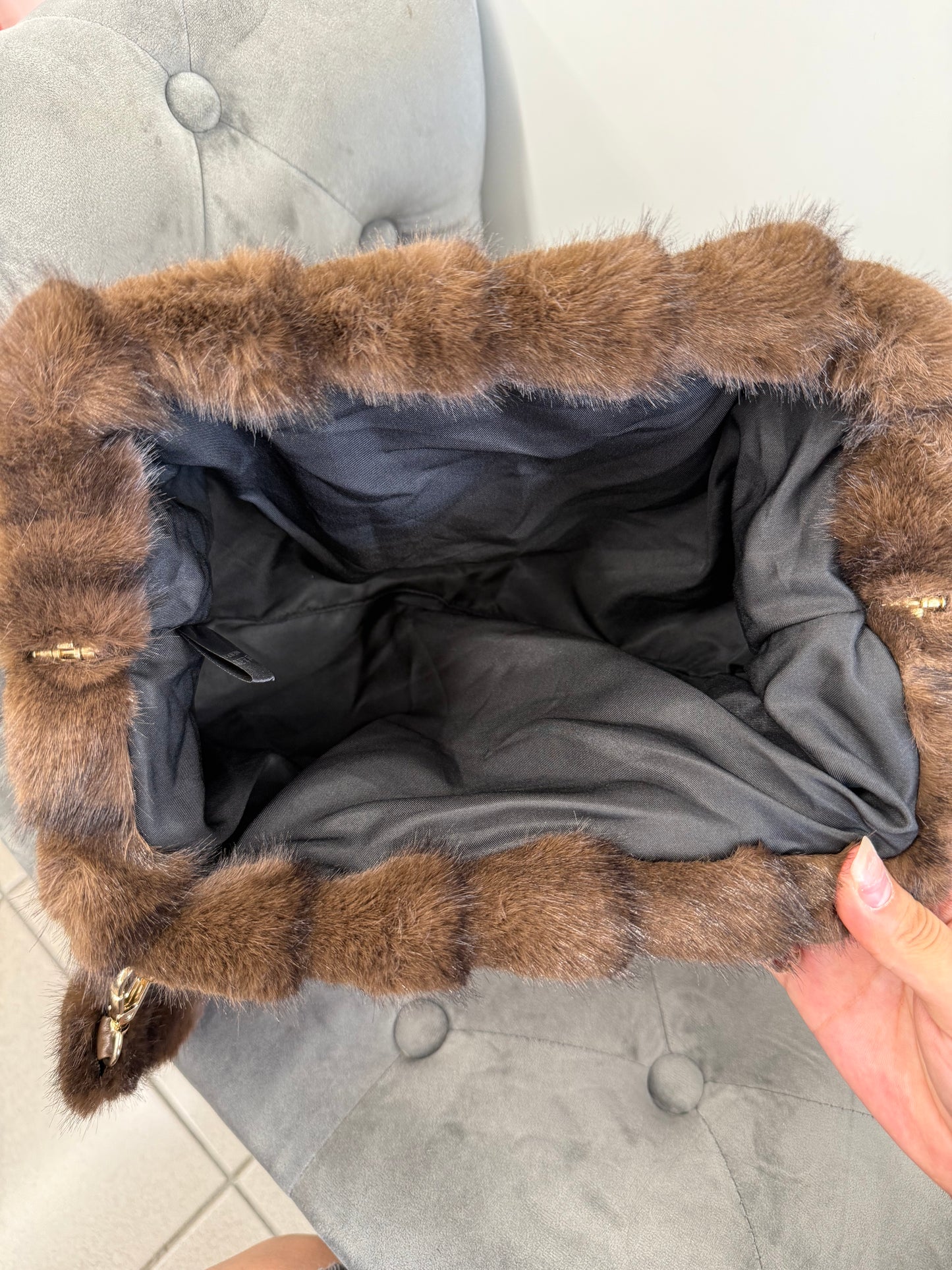 Borsa Clutch con pelliccia con tracolla