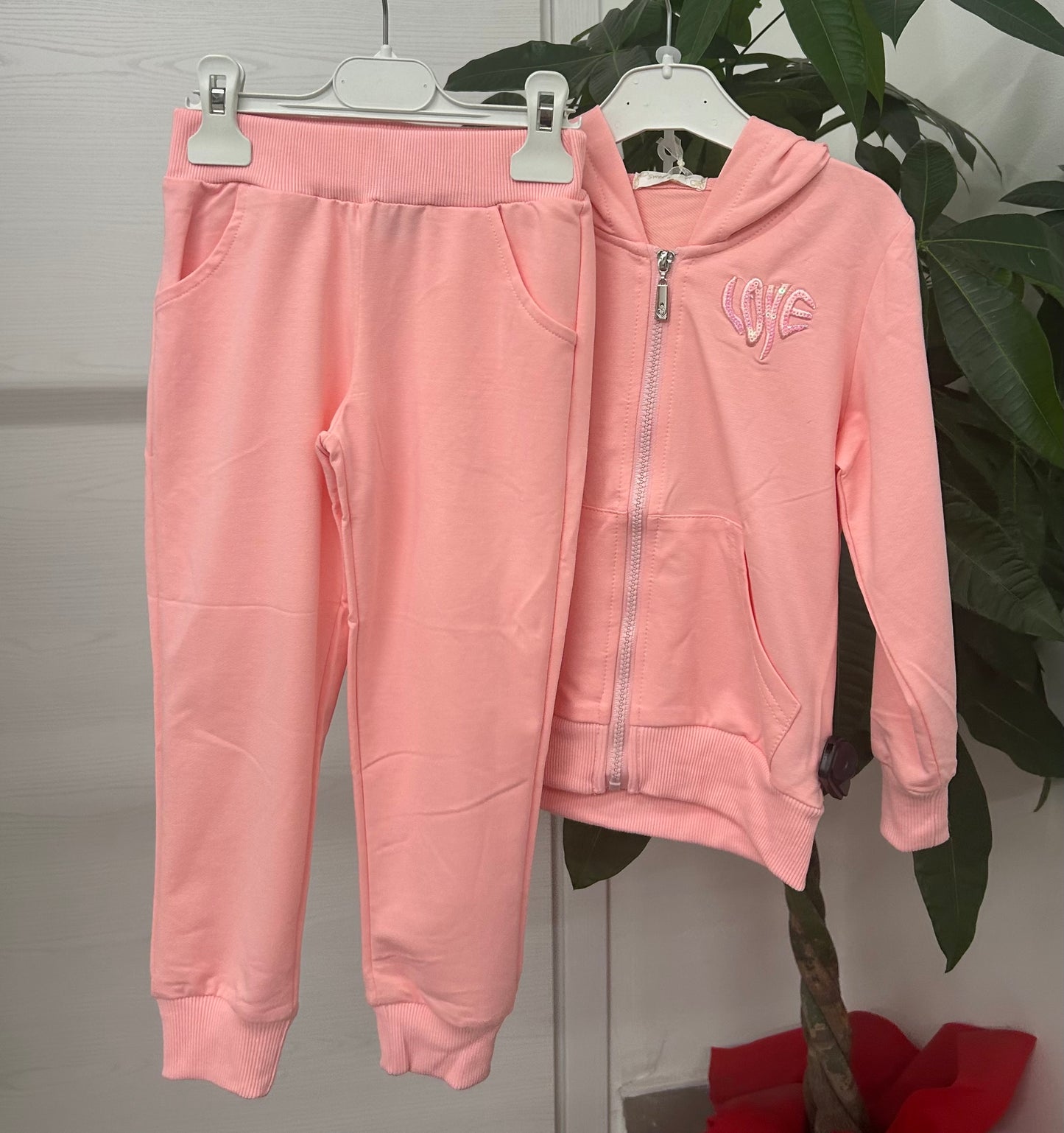 Set coordinato felpa e pantaloni con polsini