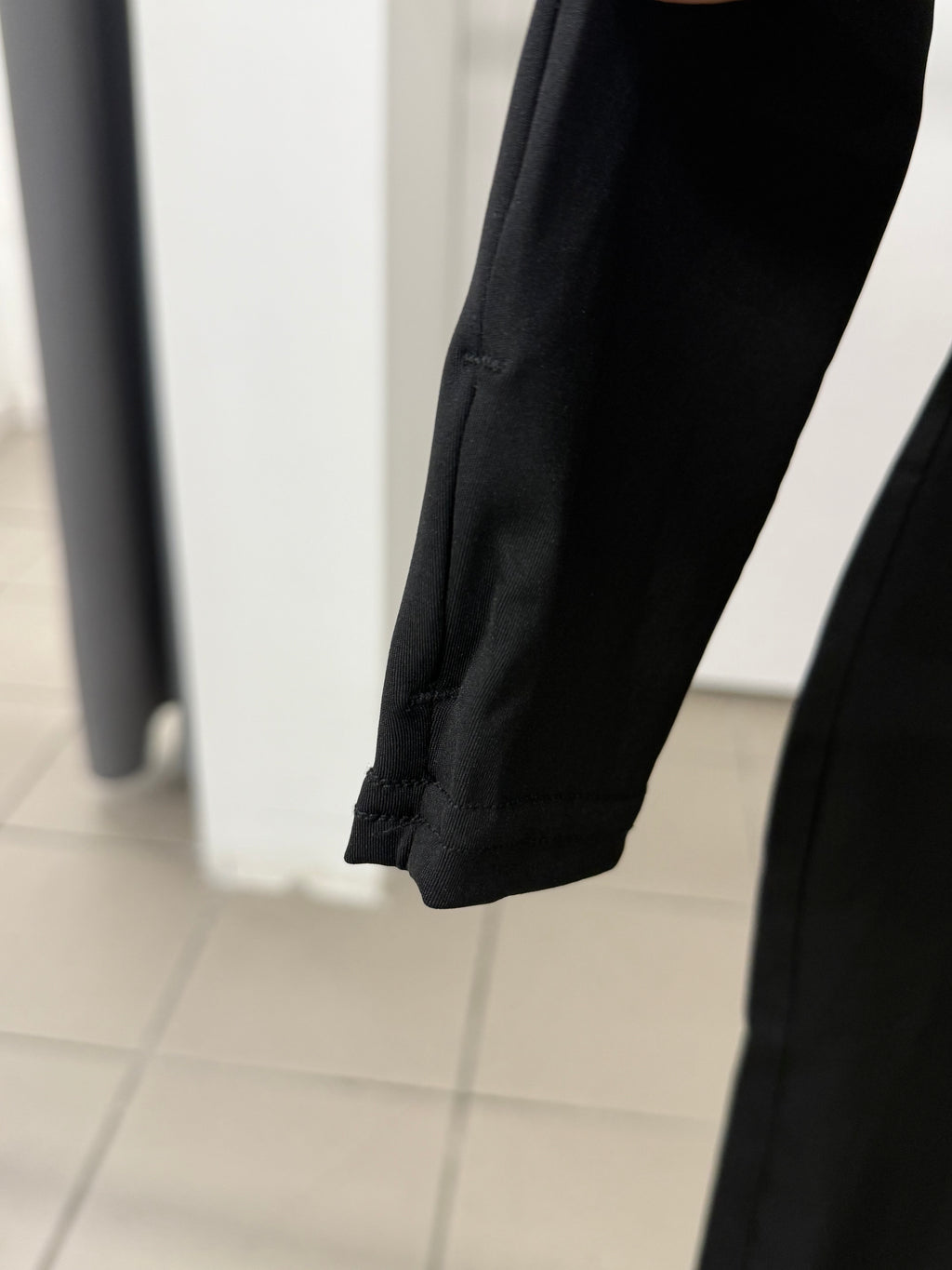 Jumpsuit in lycra con zip e manicotto