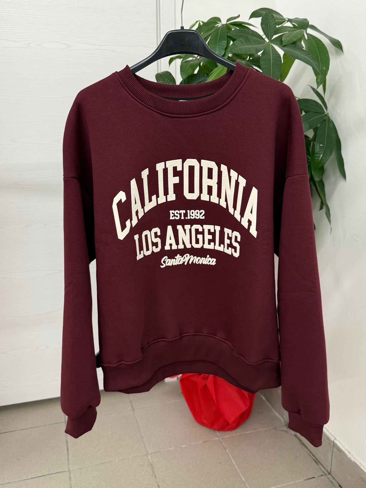 Felpa imbottita con scritta FGD MODA