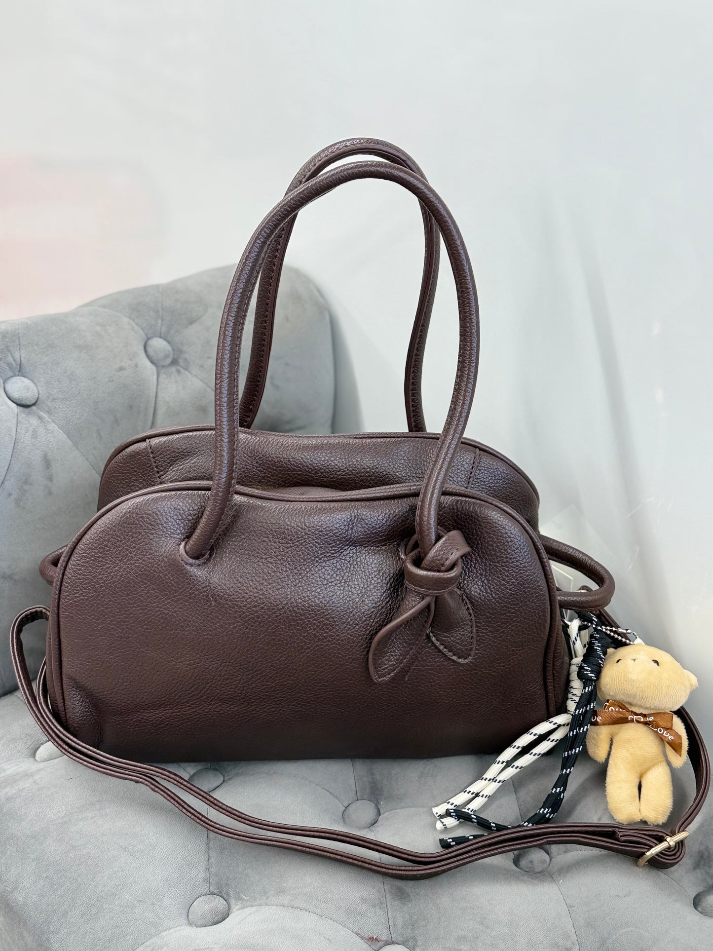 Borsa baguette con accessori e tracolla