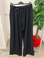Pantaloni a palazzo con fiocco FGD MODA