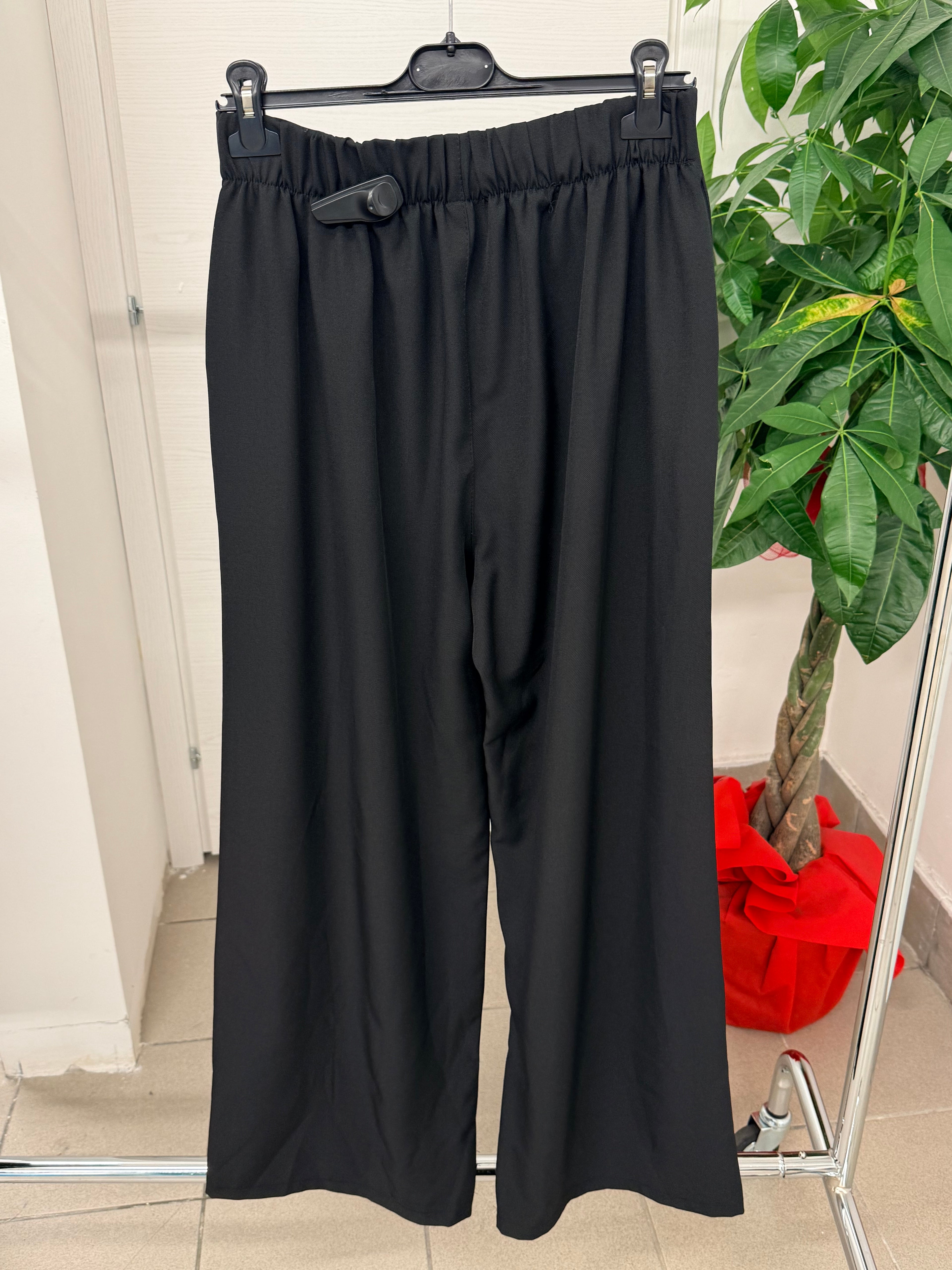Pantaloni a palazzo con fiocco FGD MODA