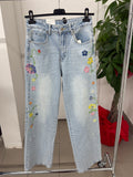 Jeans a palazzo con fiori colorati ricamati